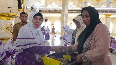 PD WI Kota Baubau Serahkan Santunan Kepada 100 Kaum Dhuafa di BUlan Ramadhan 1447 H